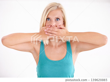 Silence, portrait and woman with hands on mouth, scared and confused with confidential secret in studio. Quiet, privacy and shocked face of girl with gossip, anxiety and surprise on white background. Silence, portrait and woman with hands on mouth, scared and confused with confidential secret in studio. Quiet, privacy and shocked face of girl with gossip, anxiety and surprise on white background. 139620865