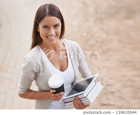 Woman, portrait and coffee with student in park, technology and education with textbooks for studying. College girl, face and happiness in outdoor by tea, books and commitment to learning on internet 139620944