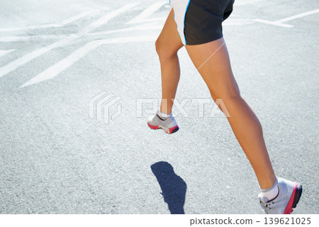 Closeup, running and legs with woman, training and exercise with commitment, endurance and challenge. Person, athlete and runner with sneakers, workout and fitness with wellness, healthy and cardio Closeup, running and legs with woman, training and exercise with commitment, endurance and challenge. Person, athlete and runner with sneakers, workout and fitness with wellness, healthy and cardio 139621025