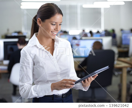 Business woman, reading on tablet and workspace for social media planning, website or software management. Young professional leader or manager on digital technology for employees workflow in office Business woman, reading on tablet and workspace for social media planning, website or software management. Young professional leader or manager on digital technology for employees workflow in office 139621042