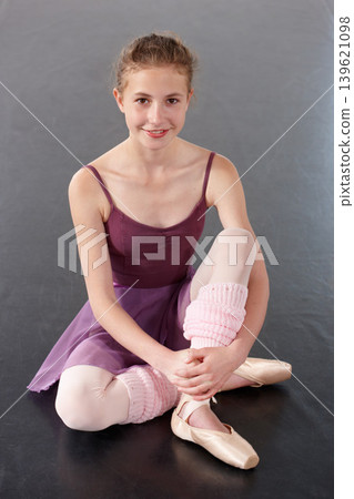 Portrait, ballerina and happy girl on floor in studio to practice, student exercise or education. Ballet, young teenager and training, dance choreography or art performance class at school in Canada Portrait, ballerina and happy girl on floor in studio to practice, student exercise or education. Ballet, young teenager and training, dance choreography or art performance class at school in Canada 139621098