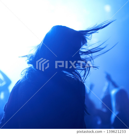 Person, dancing and crowd or live concert silhouette or music performance or festival, rock or friends. Audience, club and blue lights or celebration rave or band sound as partying, weekend or night 139621233
