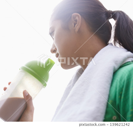 Sports, drink and woman with protein shake in bottle for health, wellness and energy benefits after exercise. Outdoor, fitness or person with smoothie in container for nutrition in diet after workout Sports, drink and woman with protein shake in bottle for health, wellness and energy benefits after exercise. Outdoor, fitness or person with smoothie in container for nutrition in diet after workout 139621242
