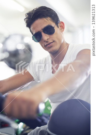 Portrait, man and motorcycle with sunglasses, cool and travel with training, riding and journey. Face, person and biker with stylish outfit, fun and casual eyewear with extreme sport or adventure Portrait, man and motorcycle with sunglasses, cool and travel with training, riding and journey. Face, person and biker with stylish outfit, fun and casual eyewear with extreme sport or adventure 139621313