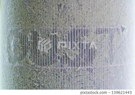 Close Up of Dirty Air Filter Covered with Dust and Lint Close Up of Dirty Air Filter Covered with Dust and Lint 139621443