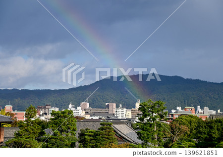Rainbow on the sky from the view of nijo jo castle, Kyoto, Japan. World Heritage Site. Major tourist attraction in Kansai region in Japan. Japan famous historic architecture. Nature scene. Rainbow on the sky from the view of nijo jo castle, Kyoto, Japan. World Heritage Site. Major tourist attraction in Kansai region in Japan. Japan famous historic architecture. Nature scene. 139621851