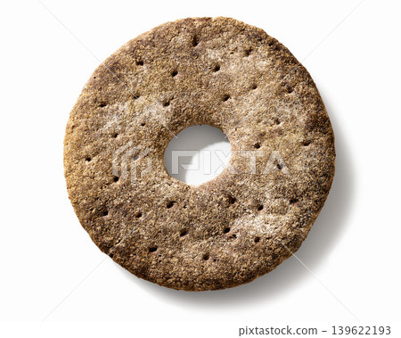 Finnish ring shaped rye bread on white background Finnish ring shaped rye bread on white background 139622193