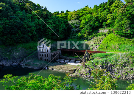 The current state of the Sogi Power Plant ruins, surrounded by fresh greenery. The current state of the Sogi Power Plant ruins, surrounded by fresh greenery. 139622213