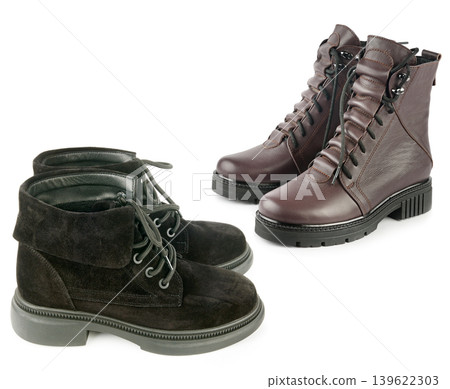 Pair of Leather and Suede Winter Boots Isolated on White Pair of Leather and Suede Winter Boots Isolated on White 139622303