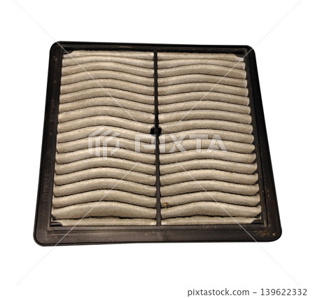 Dirty air filter on white background showing accumulated dust and debris for car maintenance. 139622332
