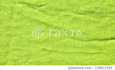 vibrant neon lime green corduroy fabric closeup macro texture ribbed ridges soft folds vibrant neon lime green corduroy fabric closeup macro texture ribbed ridges soft folds 139622569