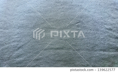 gray fabric texture with central subtle stain abstract closeup background gray fabric texture with central subtle stain abstract closeup background 139622577