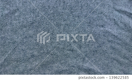 blue denim texture closeup macro detailed twill weave natural creases faded indigo cotton fabric blue denim texture closeup macro detailed twill weave natural creases faded indigo cotton fabric 139622585