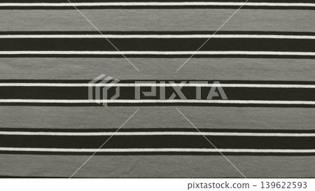striped knit fabric texture bold horizontal black gray white patterns closeup background modern fashion apparel design striped knit fabric texture bold horizontal black gray white patterns closeup background modern fashion apparel design 139622593