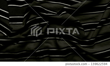elegant wrinkled black white striped textile closeup capturing soft folds dramatic shadows fabric pattern elegant wrinkled black white striped textile closeup capturing soft folds dramatic shadows fabric pattern 139622594