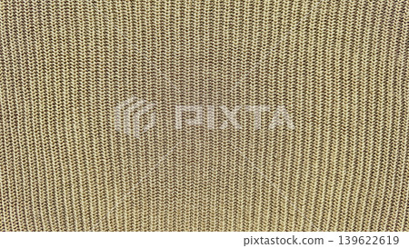 beige ribbed knit fabric macro texture evoking cozy warmth in detailed closeup view beige ribbed knit fabric macro texture evoking cozy warmth in detailed closeup view 139622619