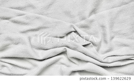crumpled white terrycloth folds abstract texture closeup serene neutral tones crumpled white terrycloth folds abstract texture closeup serene neutral tones 139622629