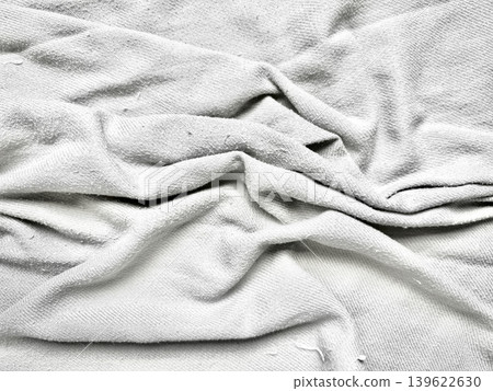 crumpled white fabric folds texture abstract closeup serene minimalism crumpled white fabric folds texture abstract closeup serene minimalism 139622630