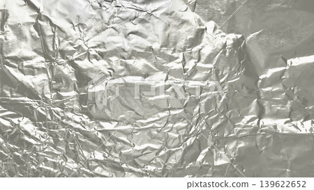 crumpled aluminum foil texture reflecting soft studio light with metallic wrinkles creating abstract industrial background crumpled aluminum foil texture reflecting soft studio light with metallic wrinkles creating abstract industrial background 139622652