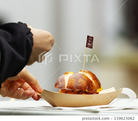 Gourmet street food burger in cardboard tray Karlin Prague Gourmet street food burger in cardboard tray Karlin Prague 139623062