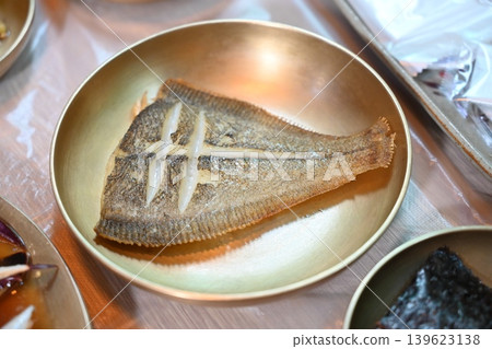 Pan Fried Flounder Served in Traditional Korean Brass Bowl Pan Fried Flounder Served in Traditional Korean Brass Bowl 139623138