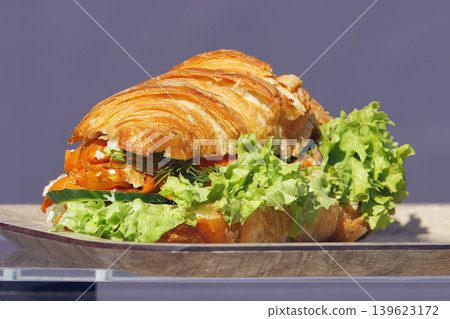 Fresh salmon croissant sandwich at outdoor farmers market 139623172