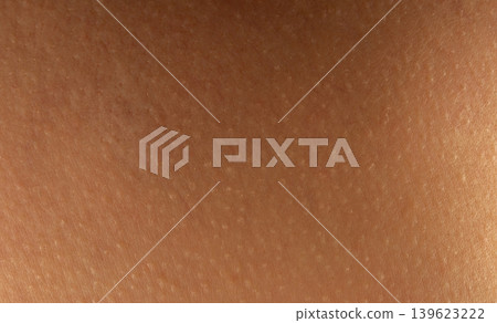 Brown clean human skin background Brown clean human skin background 139623222