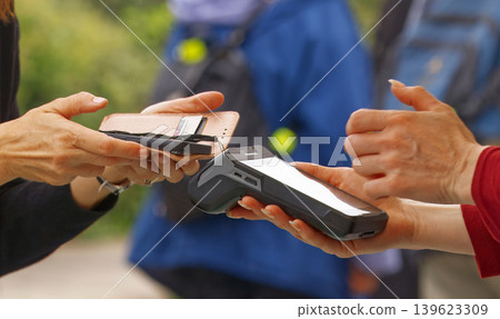 Contactless smartphone payment at outdoor festival in Prague Contactless smartphone payment at outdoor festival in Prague 139623309