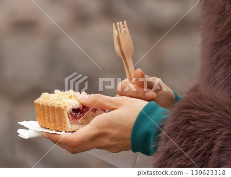 Woman Holding Cherry Cake at Naplavka Market Woman Holding Cherry Cake at Naplavka Market 139623318