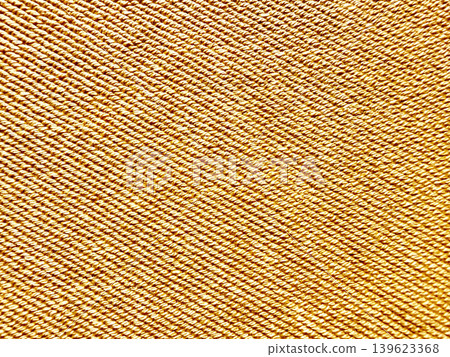 golden fabric texture macro diagonal weave luxurious corded yarn pattern abstract textile shiny metallic detail golden fabric texture macro diagonal weave luxurious corded yarn pattern abstract textile shiny metallic detail 139623368