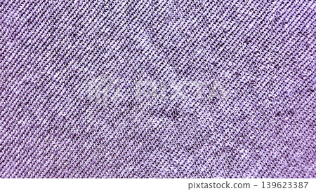 purple knitted fabric macro texture revealing soft lavender yarn loops in intricate diagonal weave pattern purple knitted fabric macro texture revealing soft lavender yarn loops in intricate diagonal weave pattern 139623387