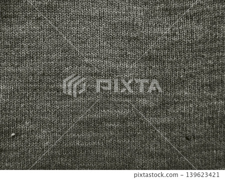 gray knitted fabric texture macro close up intricate wool yarn stitch pattern cozy detail gray knitted fabric texture macro close up intricate wool yarn stitch pattern cozy detail 139623421