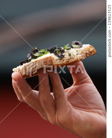 Hand Holding Czech Open Sandwich at Naplavka Hand Holding Czech Open Sandwich at Naplavka 139623525