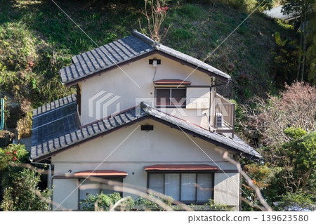 Detached house with a ridge roof Detached house with a ridge roof 139623580