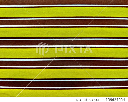 striped jersey knit fabric vibrates with vibrant lime green chocolate brown horizontal stripes in macro closeup texture striped jersey knit fabric vibrates with vibrant lime green chocolate brown horizontal stripes in macro closeup texture 139623634