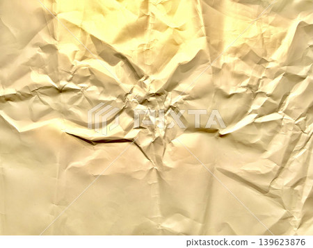 crumpled beige paper texture reveals dramatic central tear radiating chaotic organic wrinkle under warm natural light crumpled beige paper texture reveals dramatic central tear radiating chaotic organic wrinkle under warm natural light 139623876