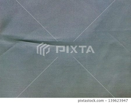 blue gray fabric texture drapes softly with natural wrinkle revealing intricate weave in minimalist serenity blue gray fabric texture drapes softly with natural wrinkle revealing intricate weave in minimalist serenity 139623947