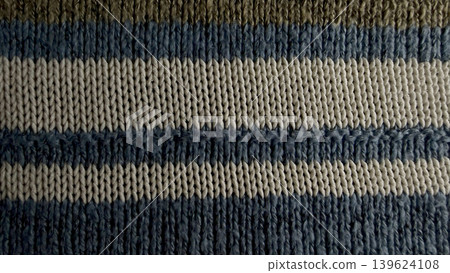 striped knit wool macro texture closeup in cozy navy beige olive evoking authentic sustainable warmth tactile comfort striped knit wool macro texture closeup in cozy navy beige olive evoking authentic sustainable warmth tactile comfort 139624108
