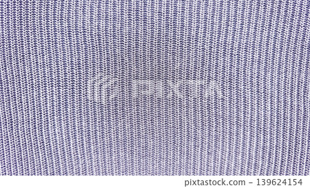 cozy blue and white knitted fabric closeup unveils intricate vertical rib texture 139624154
