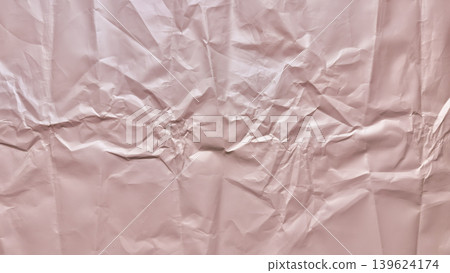 crumpled soft pink paper texture with intricate folds and delicate shadows in abstract minimalist composition crumpled soft pink paper texture with intricate folds and delicate shadows in abstract minimalist composition 139624174