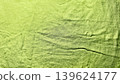 lime green textured bird imprint on sustainable handmade paper with organic fibers and serene natural mood 139624177