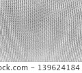 soft gray ribbed knit fabric texture captured in intricate macro evoking cozy minimalist sustainable authenticity 139624184