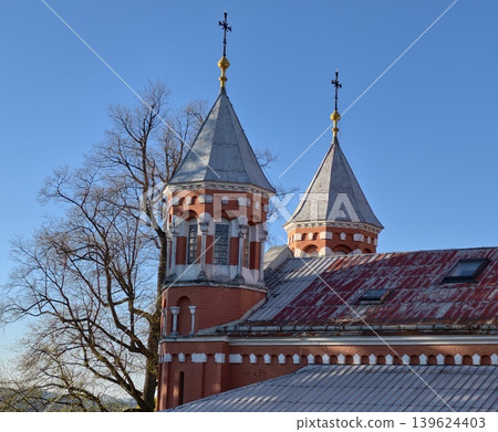Historical Brick Church With Leafless Tree Silhouette And Aerial Imaging Exploration Potential 139624403