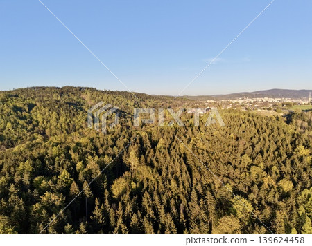 Nature And City. Luminous Wooded Slopes Surround And Complement Bustling City In Perfect Balance Nature And City. Luminous Wooded Slopes Surround And Complement Bustling City In Perfect Balance 139624458