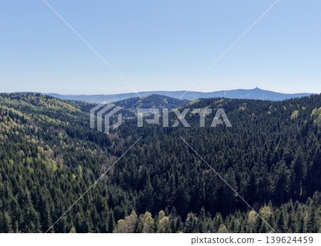 Sprawling Countryside With Hills. Immense Panoramic Scene Displaying Trees And Towering Mountain Ranges Sprawling Countryside With Hills. Immense Panoramic Scene Displaying Trees And Towering Mountain Ranges 139624459
