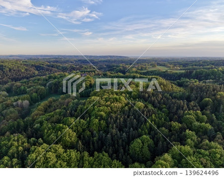 Drone Captures Lush Scenery. Panoramic Imagery Showcasing Peaceful Woodland Surroundings At Sunset Drone Captures Lush Scenery. Panoramic Imagery Showcasing Peaceful Woodland Surroundings At Sunset 139624496