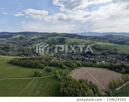 Farmland Aerial View. Agricultural Landscape Featuring Ploughed Fields And Lush Pastures From Above Farmland Aerial View. Agricultural Landscape Featuring Ploughed Fields And Lush Pastures From Above 139624509