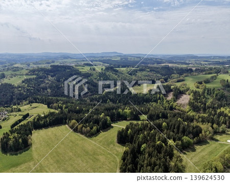 Scenic View Of Forests And Fields. Picturesque Landscape With Vibrant Greenery And Airy Cloud Cover Scenic View Of Forests And Fields. Picturesque Landscape With Vibrant Greenery And Airy Cloud Cover 139624530