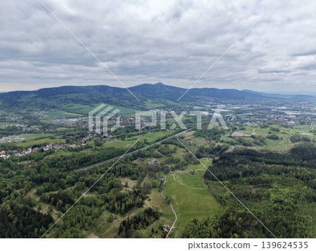 Idyllic Aerial Perspective Of Tranquil River Navigating Through Rolling Countryside And Wetlands Idyllic Aerial Perspective Of Tranquil River Navigating Through Rolling Countryside And Wetlands 139624535