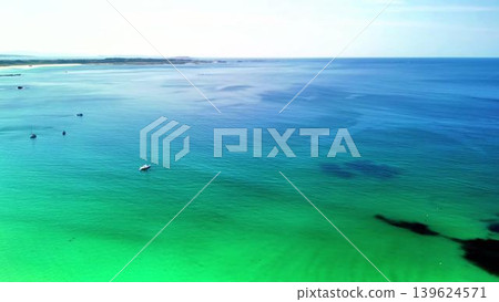 Enjoy the Stunning Aerial View of Pristine Turquoise Ocean Waters, capturing the beauty of nature Enjoy the Stunning Aerial View of Pristine Turquoise Ocean Waters, capturing the beauty of nature 139624571